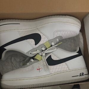 Nike White and Black Sneakers with Red and Yellow Accents boys 7